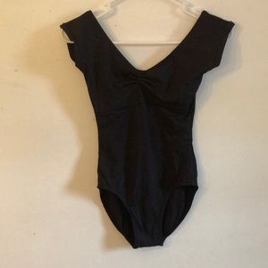 Gaynor Minden leotard. Black with capped sleeves.